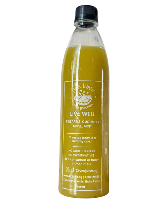A 500ml bottle of Ara juice live well fresh fruit juice blend made with pineapple, mint, apple, cucumber on a white background 